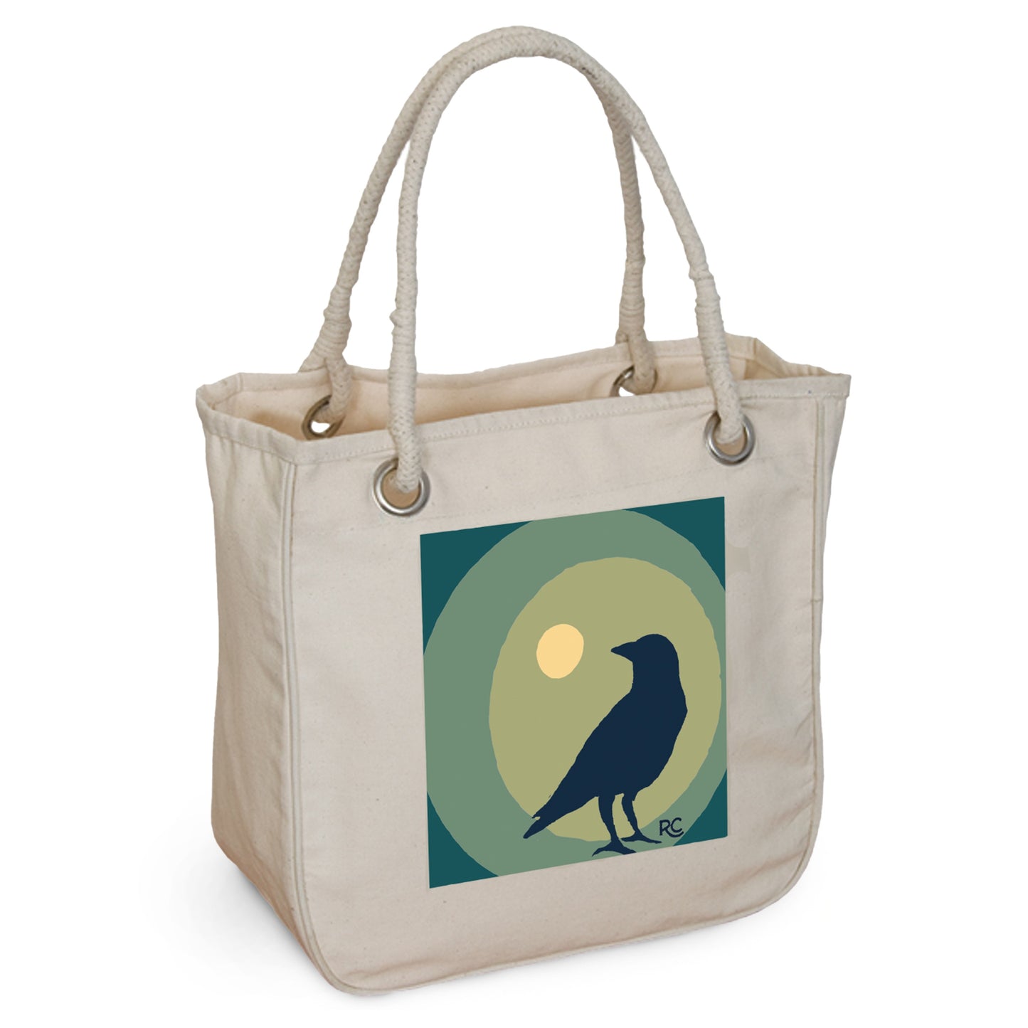 Introducing Rustic County's Moonstruck Crow Rope Tote, an elegant beige canvas bag made from organic cotton, featuring a crow silhouetted against blue and green bands with a sun backdrop. It has sturdy rope handles and metal eyelets.