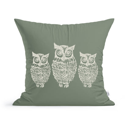The Rustic County Hooty Owls Pillow is a green cushion with a white design of three stylized owls in a row, detailed feather and facial patterns, and made from 100% cotton—perfect as a cozy owl lover accessory.