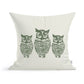 The Rustic County Hooty Owls Pillow is a 100% cotton accent featuring three detailed, green owls in a row—perfect for owl lovers to add charm to any room.