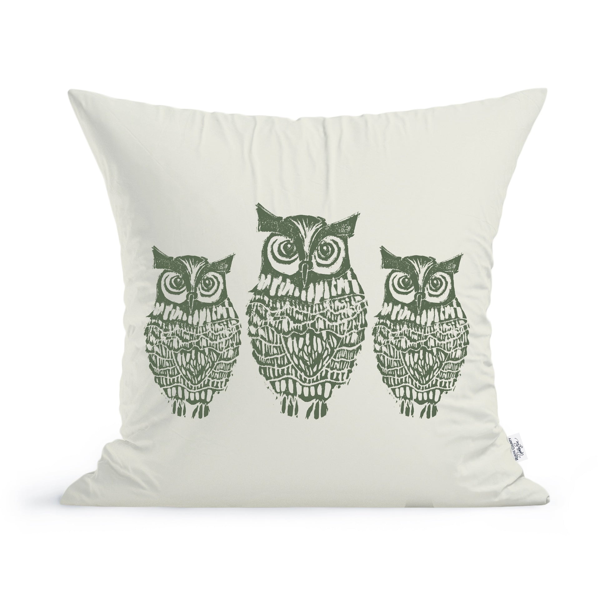 The Rustic County Hooty Owls Pillow is a 100% cotton accent featuring three detailed, green owls in a row—perfect for owl lovers to add charm to any room.