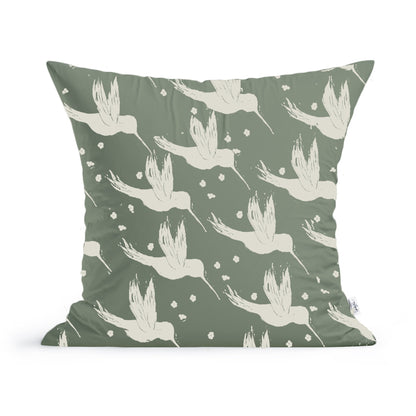 Rustic County’s Hummingbirds Pillow features a green background with cream flying birds and floral motifs—a charming accent for your home décor.