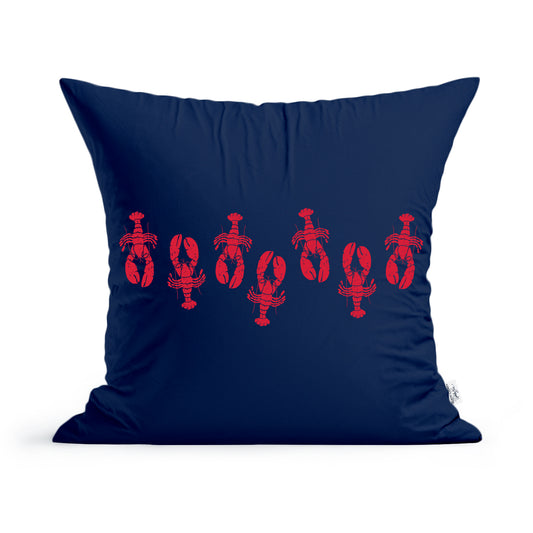 A navy blue Little Lobstahs Pillow from the Rustic County collection featuring a pattern of red lobsters arranged in a band around the center. The pillow has a soft texture, is machine washable.