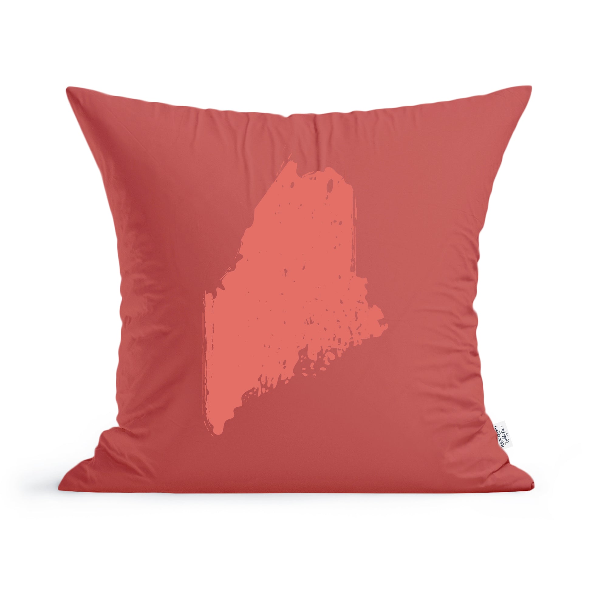 A red decorative Rustic County State of Maine throw pillow featuring a white silhouette of the state of Maine printed in the center.
