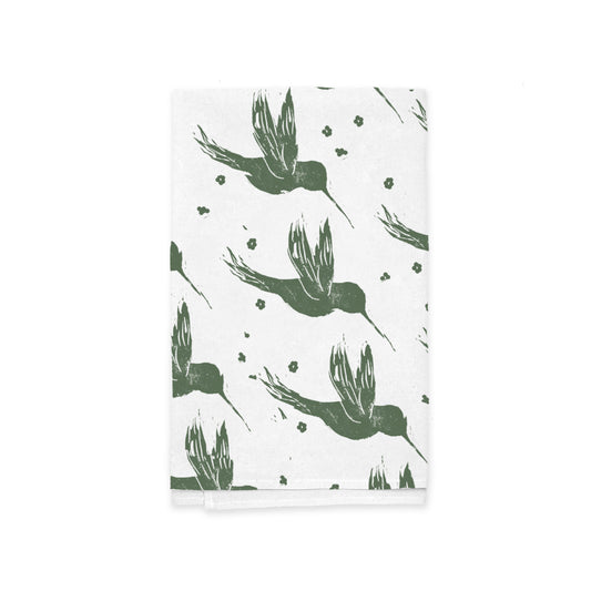 The Rustic County Hummingbirds Kitchen Tea Towel features a white fabric with a green hummingbird and floral pattern, crafted from 100% cotton for optimal absorbency.