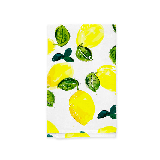 A cotton flour sac Zesty Lemons kitchen tea towel featuring vibrant yellow lemons and green leaves on a white background, depicted in a loose, watercolor style by Rustic County.