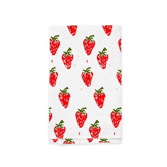 A white Sweet Strawberry Kitchen Tea Towel by Rustic County, featuring a pattern of environmentally friendly vibrant red strawberries with green leaves and small red speckles, neatly arranged and repeated throughout.